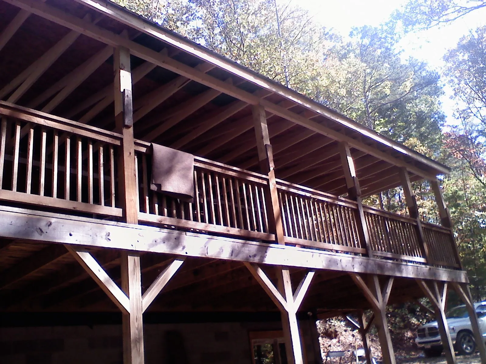 Timber framing under a new elevated porch and deck — Roof Leak Repair in Johnson City by Roofing Brothers